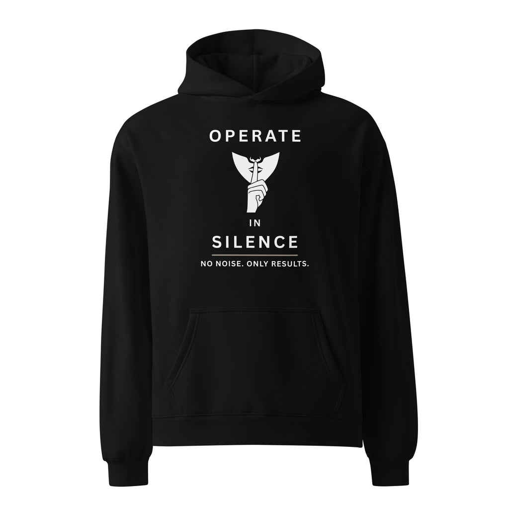 Black pullover hoodie featuring a graphic of a hand over a face with the text "OPERATE IN SILENCE - NO NOISE. ONLY RESULTS." by Mindful Craftsman.