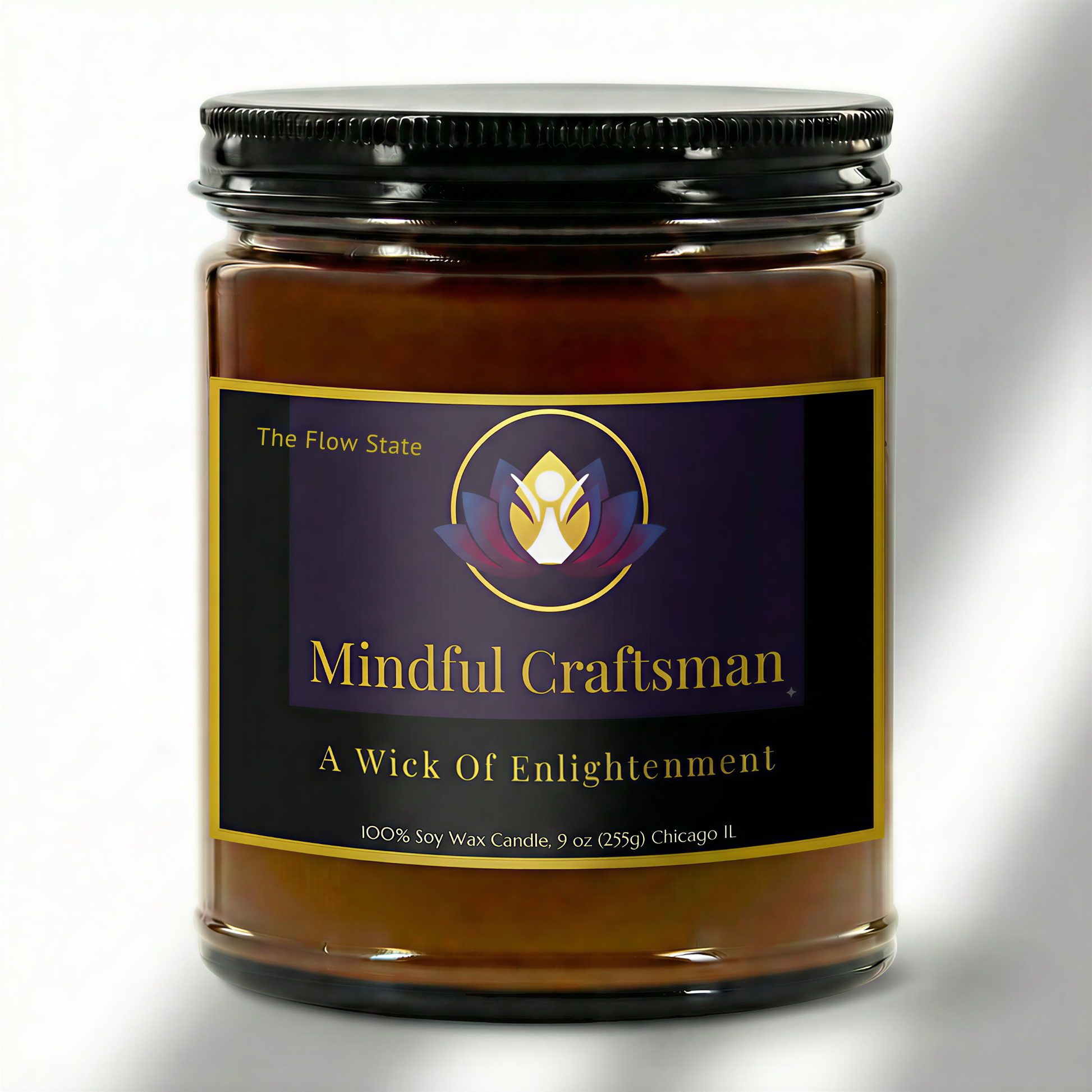 Mindful Craftsman signature candle in a dark amber vessel; the minimalist label includes the lotus logo and 'The Flow State' scent identifier.