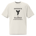 Front view of men's oversized off-white graphic t-shirt featuring 'Operate in Silence' print.