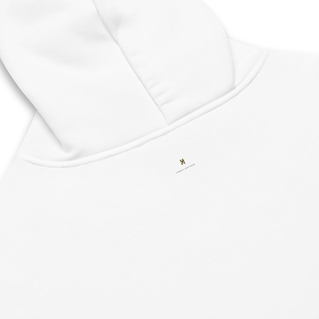 Close-up detail of the upper back neckline and hood of a white hoodie showing the small Mindful Craftsman logo.
